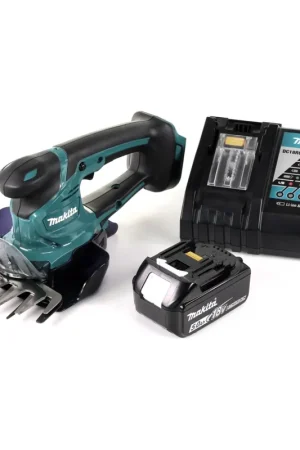 Top Vente Makita DUM 604 18V Li-ion Taille-herbe/haie sans fil + 1x Batterie BL1850 5,0 Ah + Chargeur DC 18 RC