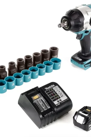 Remise Clé à chocs sans fil Makita DTW 1002 SM1 1/2" 18V 1000Nm brushless + 1x batterie 4,0Ah + chargeur + 9 pièces. Jeu de clés à douilles - sans Makpac